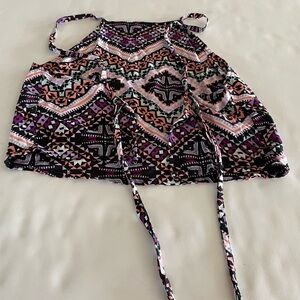 Express halter style top that ties in the back.